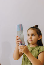 Load image into Gallery viewer, Child playing with Calm Down Bottle - Unicorn
