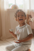 Load image into Gallery viewer, Girl playing with Tin Tea Set - Fairy Garden
