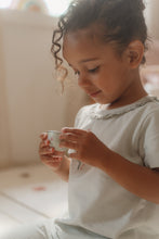 Load image into Gallery viewer, Girl playing with Tin Tea Set - Fairy Garden
