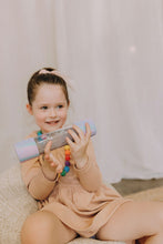 Load image into Gallery viewer, Child playing with Calm Down Bottle - Unicorn
