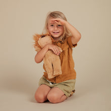 Load image into Gallery viewer, Girl playing with olli ella Cozy Dinkum Doll - Lion Pip
