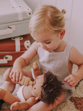 Load image into Gallery viewer, Girl playing with Ollie Ella Dinkum Doll - Sprout
