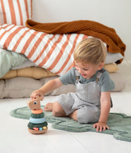 Load image into Gallery viewer, Boy playing with Done by Deer Raffi Stacking Tower
