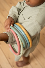 Load image into Gallery viewer, Child playing with the Little Dutch Activity Rings
